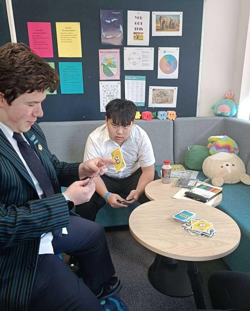 Brendon and thomas playing UNO together