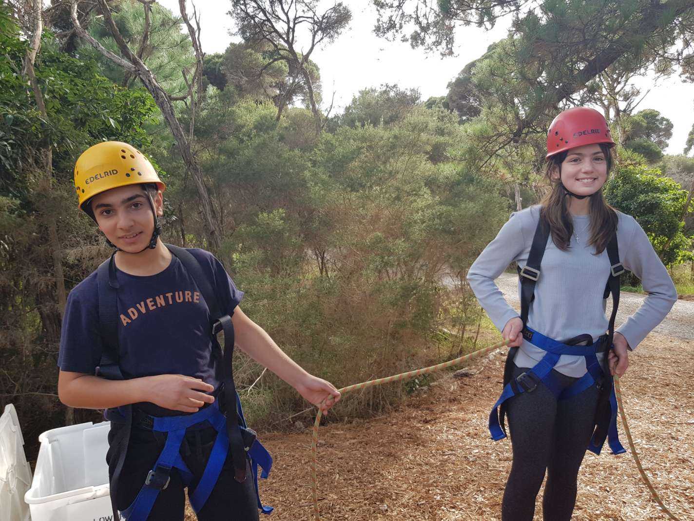 Araz and Miriam year 7 camp tree climbing
